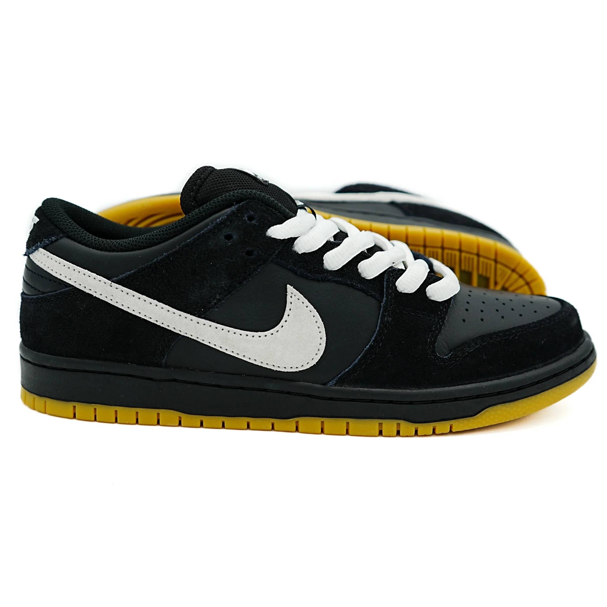 Nike SB Dunk Low - Black / White / Black
